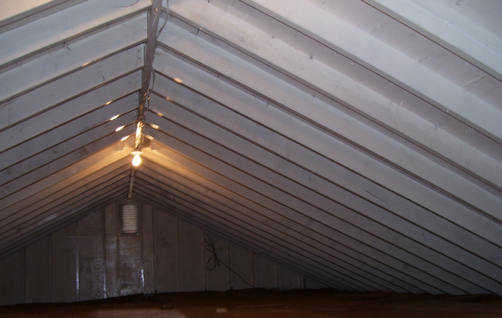 Remediated attic in Marlborough MA with clean painted roof sheathing